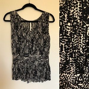 Peplum sleeveless top